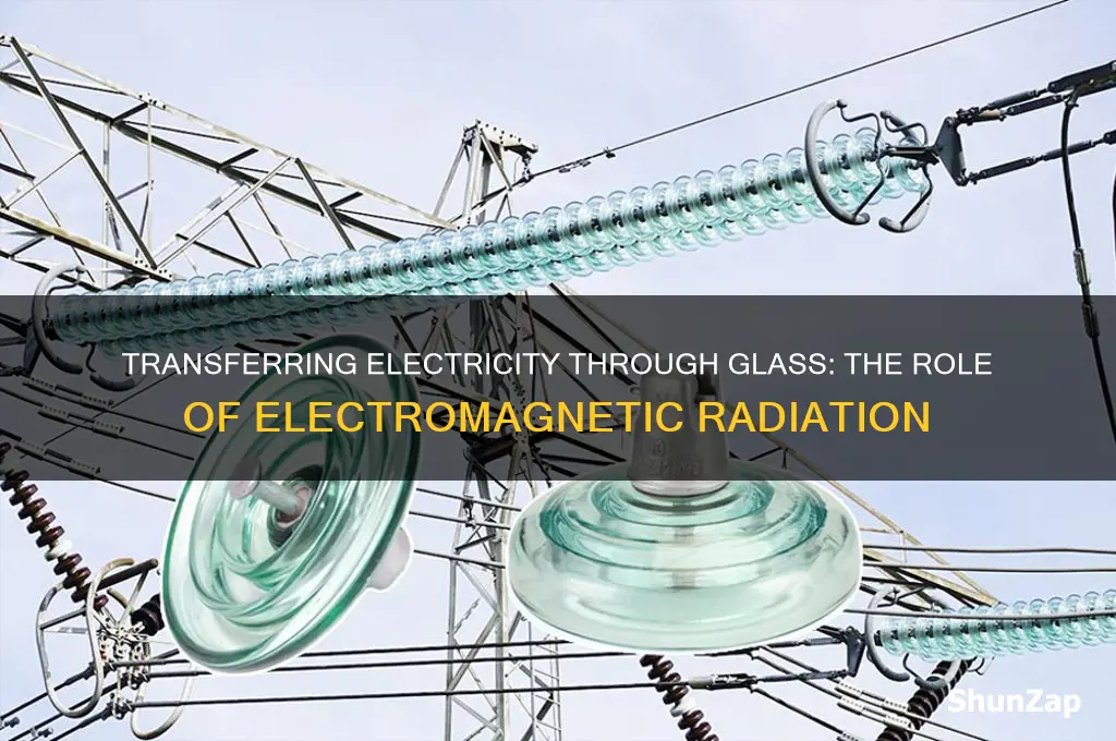 can you transfer electricity through glass using electromagnetic radiation