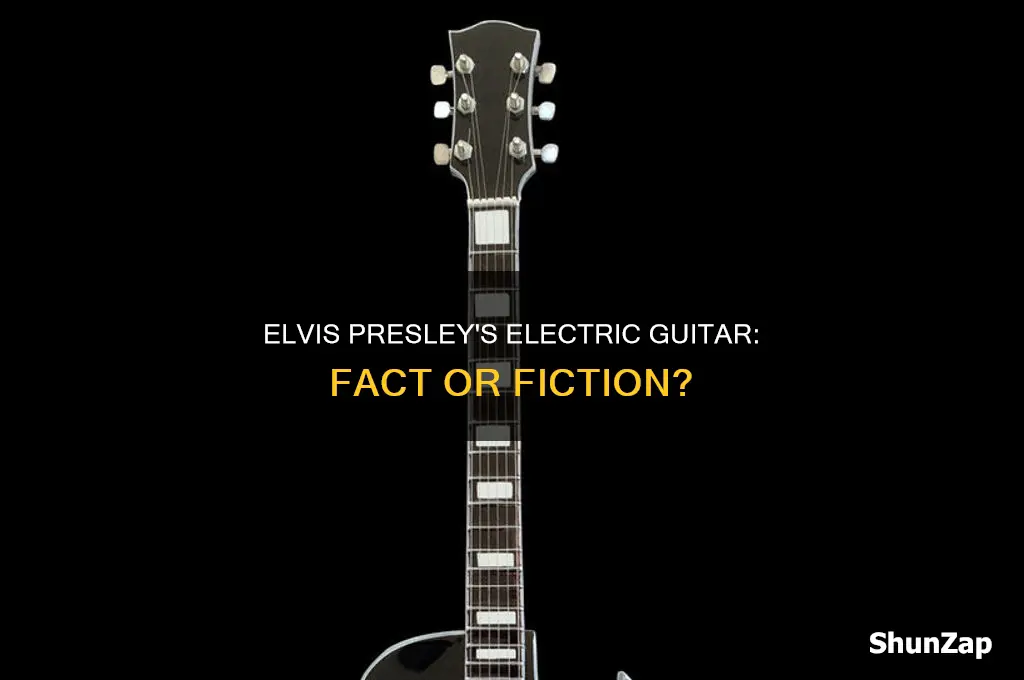did elvis presley use an electric guitar