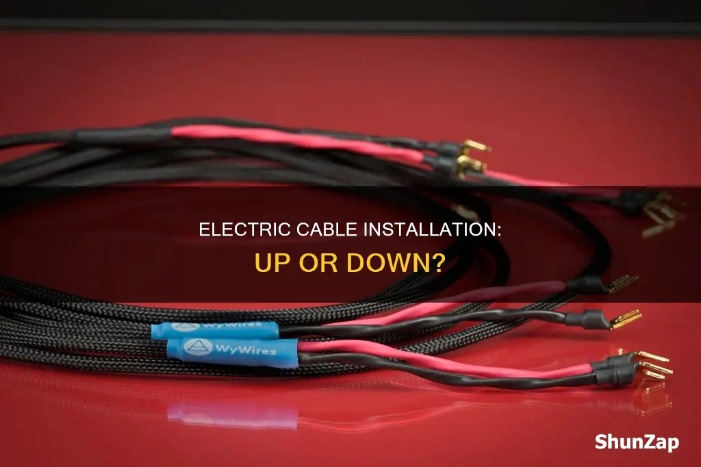 do electric cables run up or down