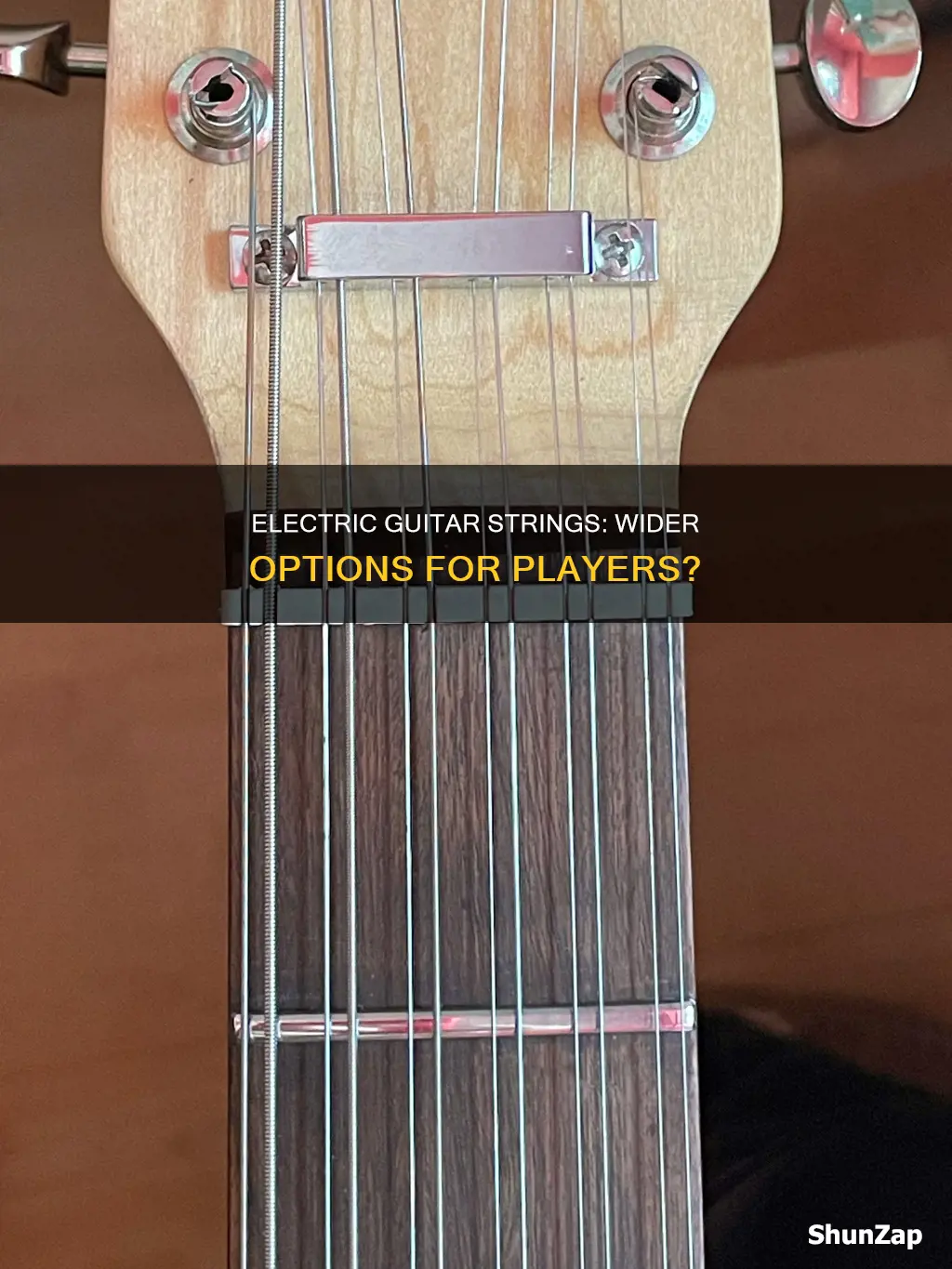 do some electric guitars have wider strings