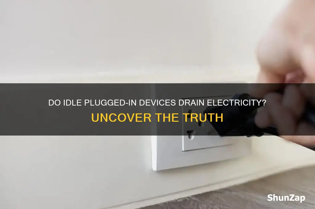 does having things plugged in but not on use electricity