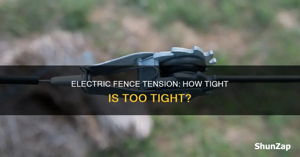 how tight should an electric fence be