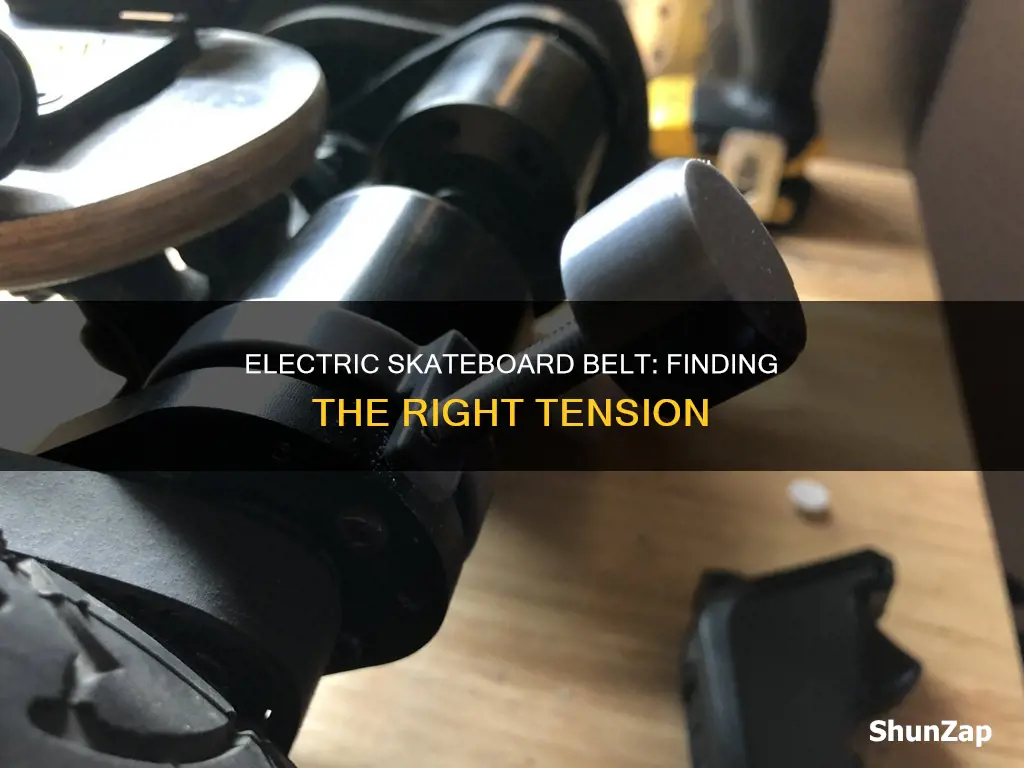 how tight should electric skateboard belt be