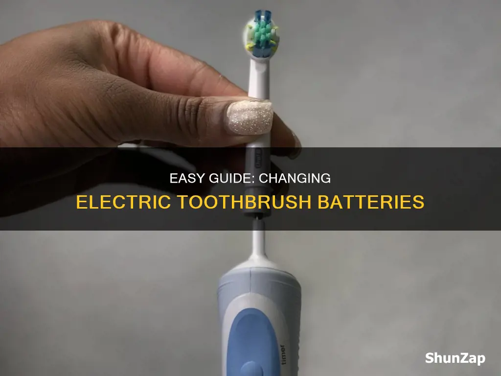 how to change batteries in electric toothbrush