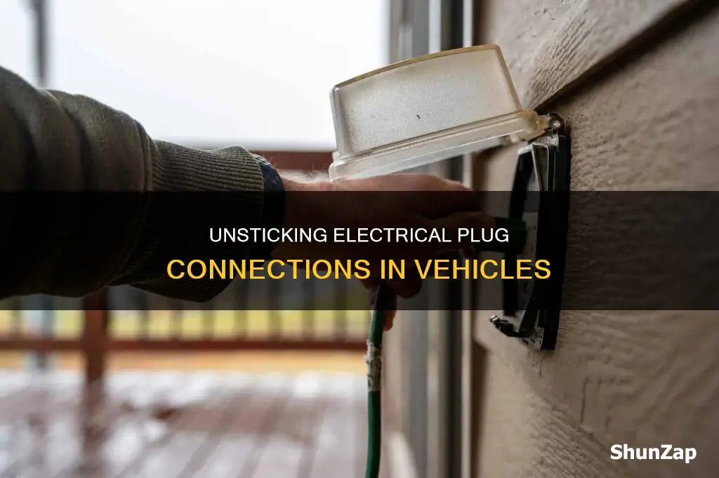 how to remove a stuck electrical plug on vehicle