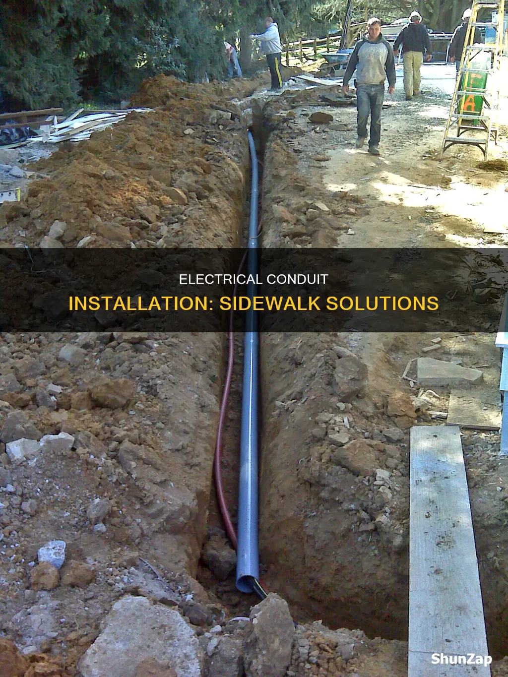 how to run electrical conduit under sidewalk