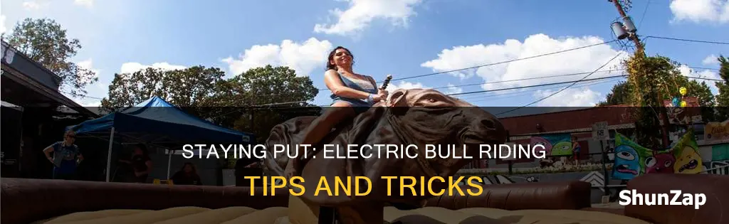 how to stay on an electric bull