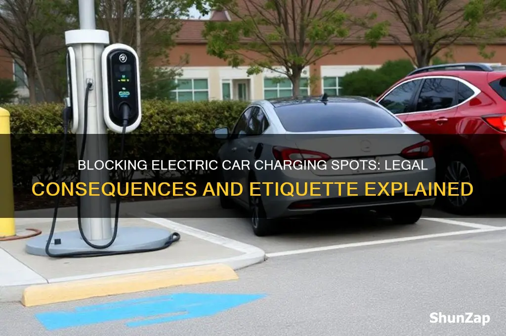 is it illegal to block electric car spots