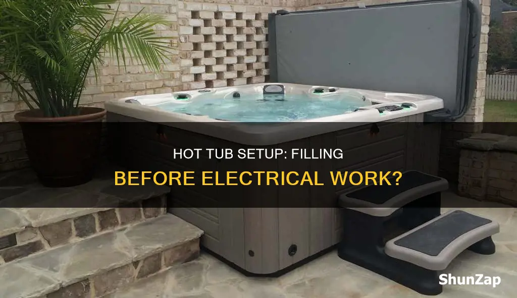 should i fill hot tub before electric