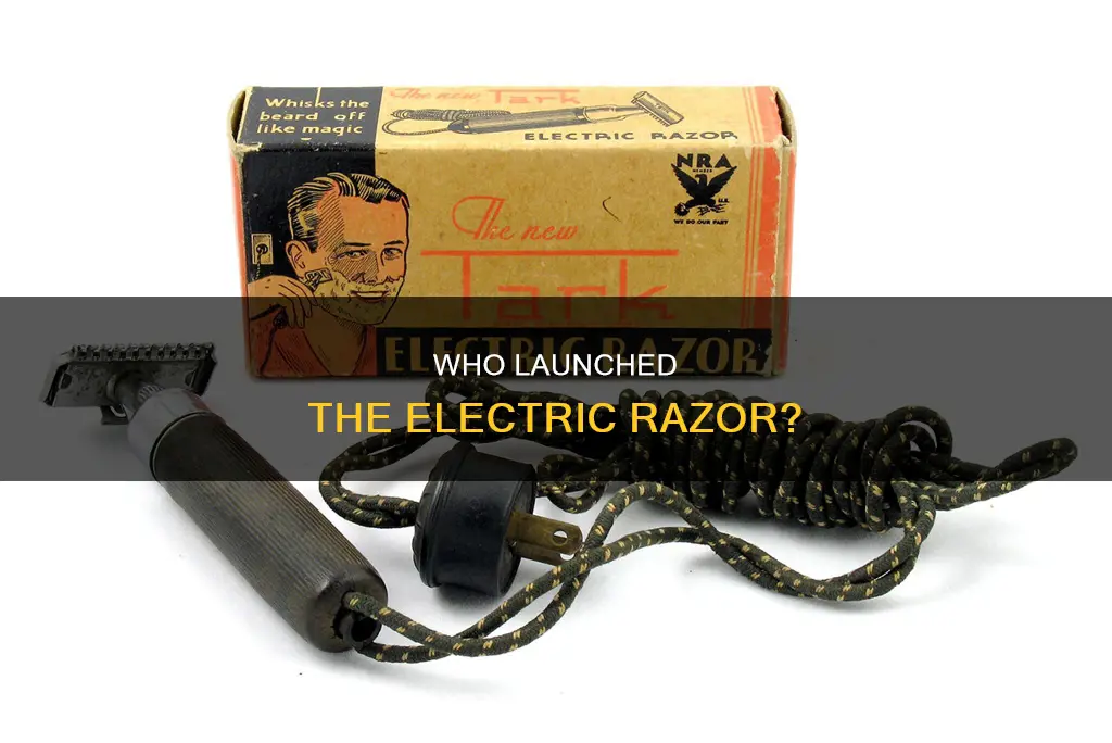 what company marketed the first electric razor