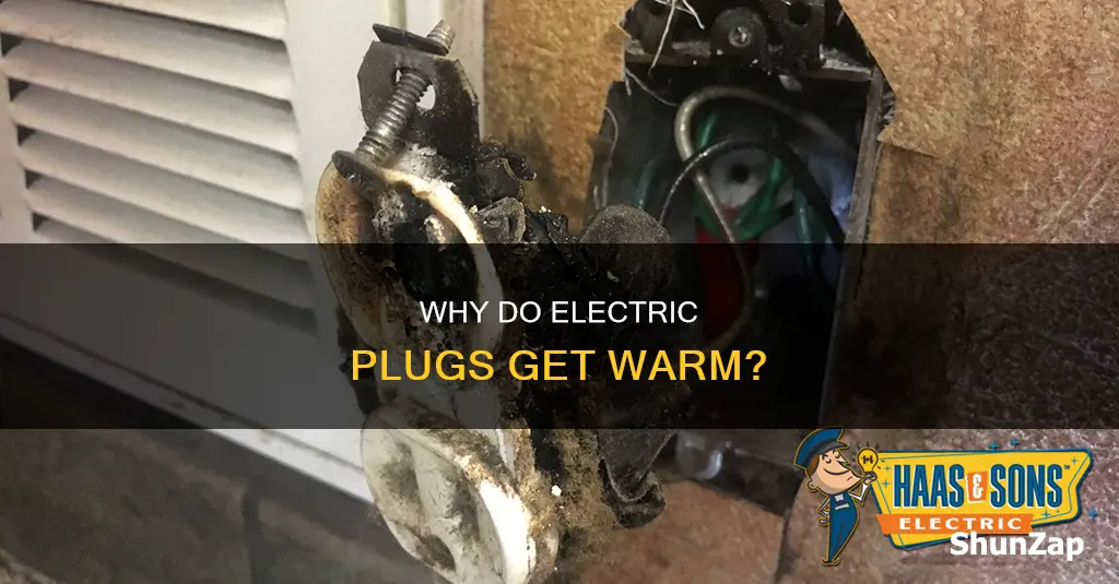 what does it mean when an electric plug is warm