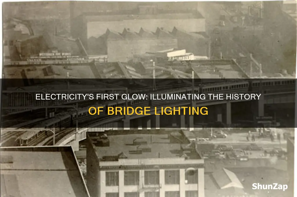 what was the first bridge to be lit using electricity