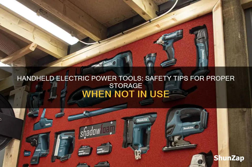 when not in use handheld electric power tool should be