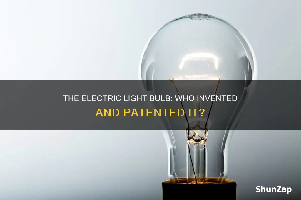 who patented the standard electric light bulb
